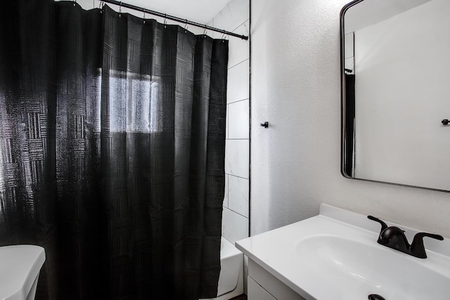 bathroom with vanity and shower / bathtub combination with curtain