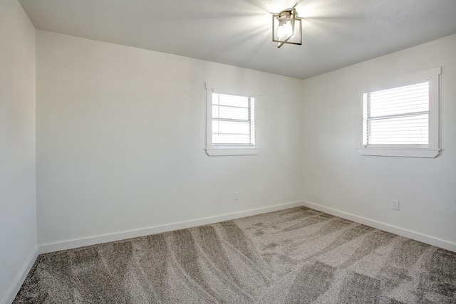 view of carpeted spare room