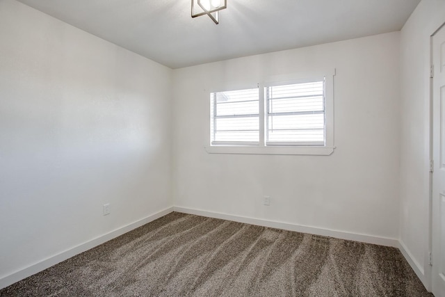 empty room featuring carpet floors