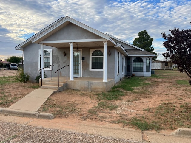 bungalow-style house featuring covered porch