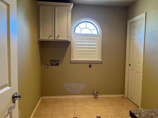 washroom with light tile patterned floors, hookup for a washing machine, and electric dryer hookup