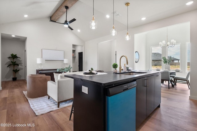 808 E 19th St, Wolfforth, TX 79382 - kitchen with dishwashing machine, a sink, beamed ceiling, dark countertops, and a center island with sink