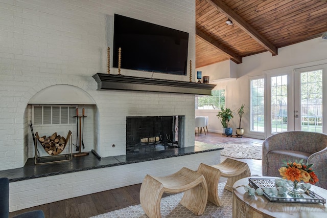 living room featuring high vaulted ceiling, wood-type flooring, a fireplace, wooden ceiling, and beamed ceiling