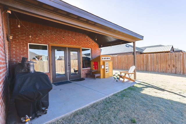 view of patio / terrace featuring area for grilling and french doors