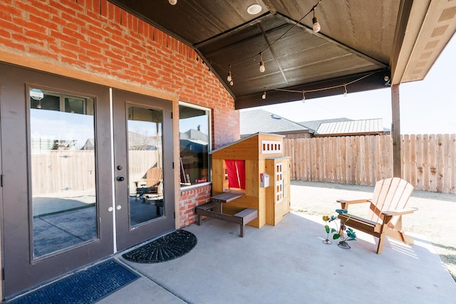 view of patio / terrace featuring french doors