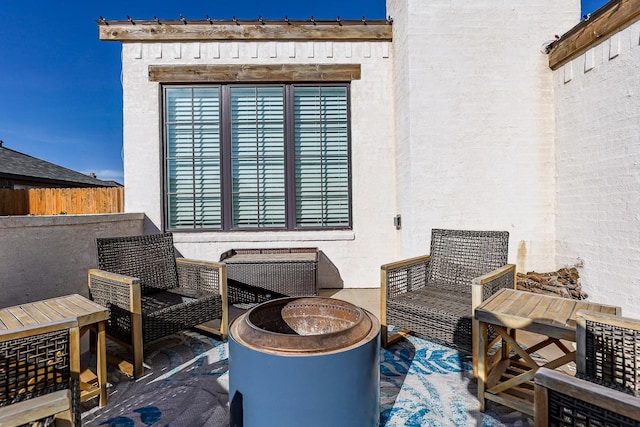 view of patio featuring a fire pit