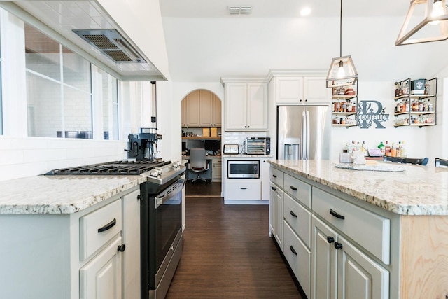 kitchen featuring backsplash, stainless steel appliances, a center island, light stone counters, and decorative light fixtures