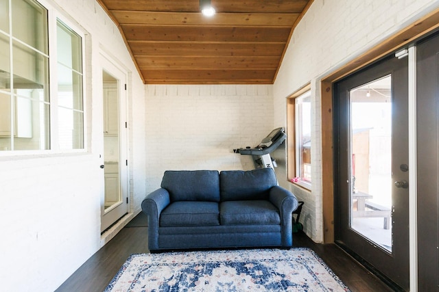 interior space featuring vaulted ceiling and wooden ceiling