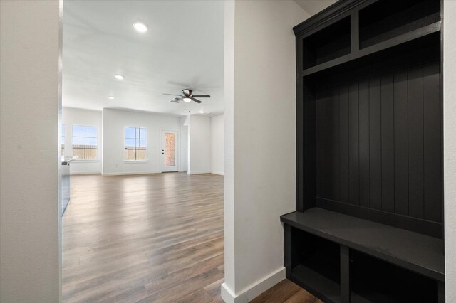 mudroom with hardwood / wood-style floors and ceiling fan