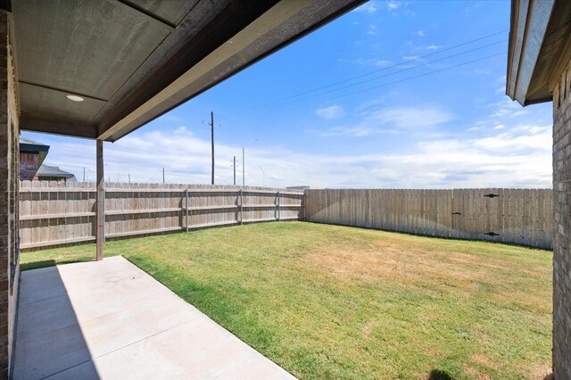 view of yard with a patio area