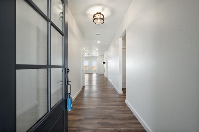 hall featuring dark hardwood / wood-style floors