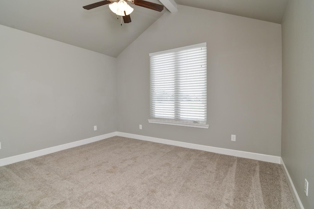 carpeted spare room with vaulted ceiling with beams and ceiling fan