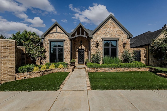 view of front of house with a front lawn