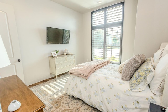 bedroom featuring light hardwood / wood-style floors