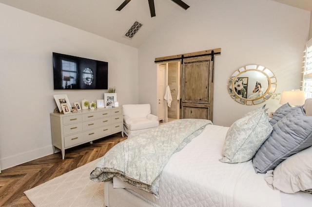 bedroom featuring ceiling fan, a barn door, vaulted ceiling, and dark parquet floors