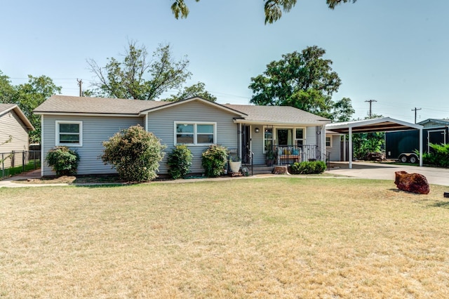 view of front facade featuring a carport, a porch, and a front lawn