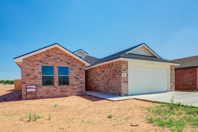 view of front of home with a garage