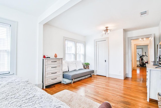 bedroom with light wood-type flooring