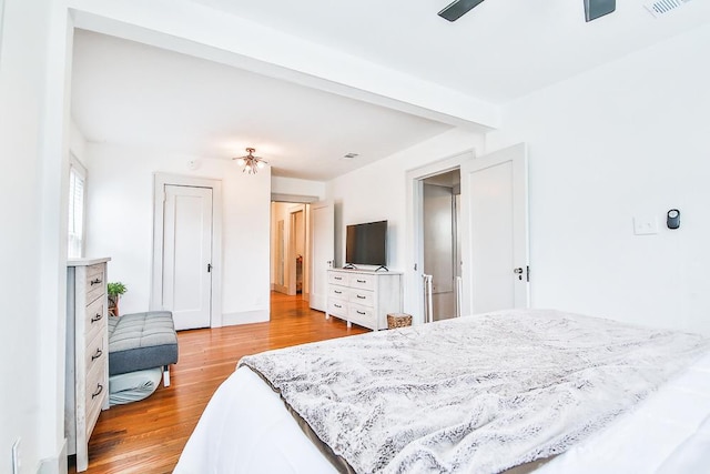 bedroom with light hardwood / wood-style floors