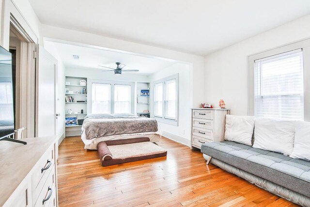 bedroom featuring ceiling fan and light hardwood / wood-style floors