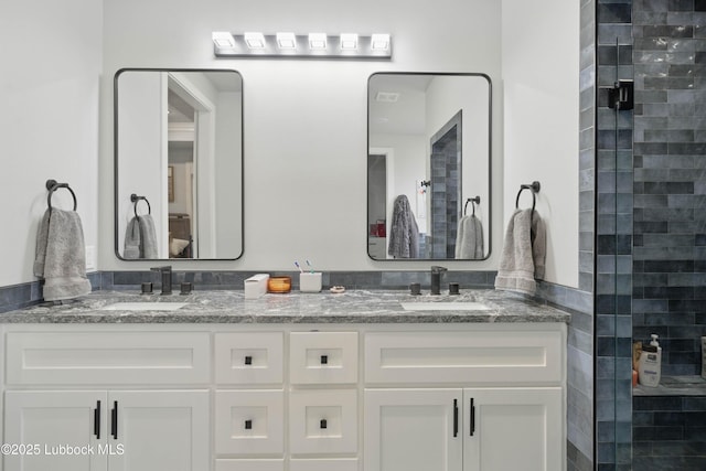 13803 Quinton Ave, Lubbock, TX 79424 - bathroom with double vanity and tiled shower