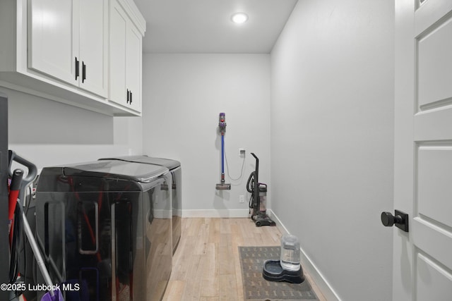 13803 Quinton Ave, Lubbock, TX 79424 - washroom featuring washing machine and clothes dryer, cabinet space, light wood finished floors, and recessed lighting