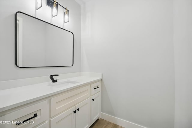 13803 Quinton Ave, Lubbock, TX 79424 - bathroom with vanity and wood finished floors