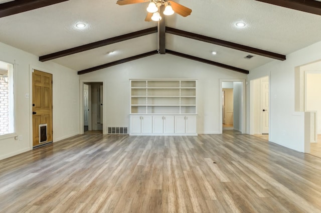 unfurnished living room with ceiling fan, lofted ceiling with beams, light hardwood / wood-style floors, and a textured ceiling