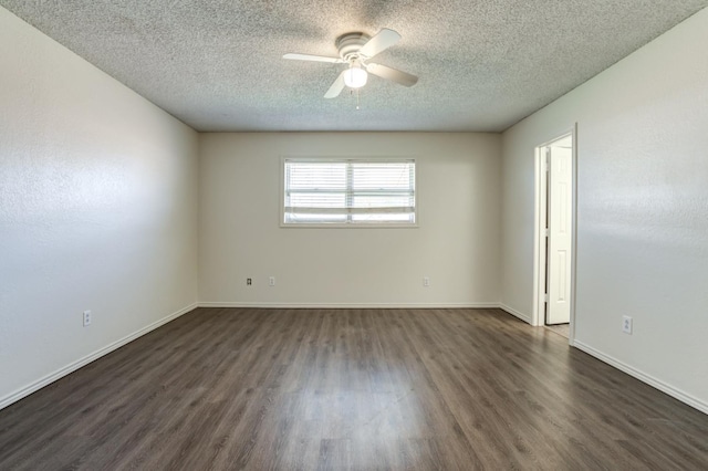 unfurnished room featuring a textured ceiling, dark hardwood / wood-style floors, and ceiling fan