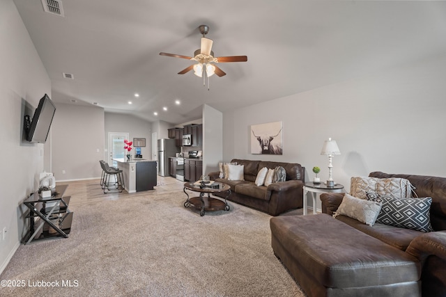 6827 38th St, Lubbock, TX 79407 - living room featuring ceiling fan, vaulted ceiling, baseboards, recessed lighting, and light carpet