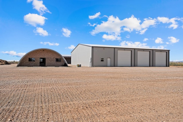 view of outbuilding with a garage