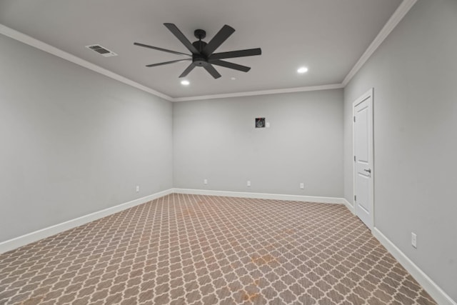 empty room with carpet floors, ornamental molding, and ceiling fan