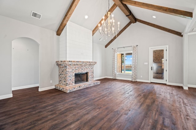 unfurnished living room with beamed ceiling, a fireplace, dark hardwood / wood-style flooring, and high vaulted ceiling