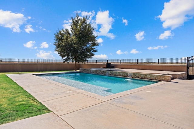 view of pool featuring pool water feature and a patio