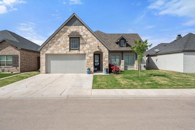 5604 117th St, Lubbock, TX 79424 - view of front facade featuring stone siding, driveway, a front yard, and a garage