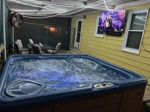 2007 25th St, Lubbock, TX 79411 - view of patio / terrace with a hot tub