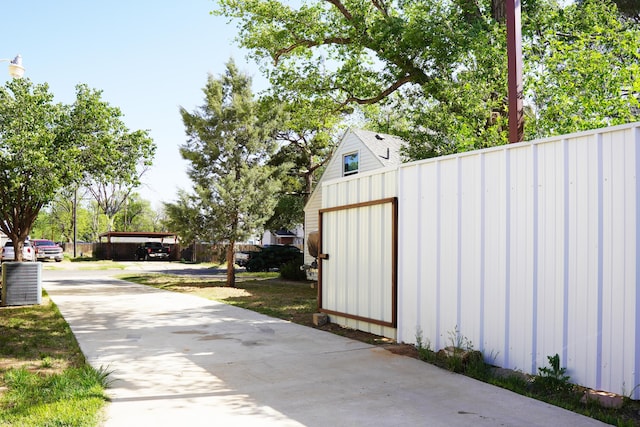 2007 25th St, Lubbock, TX 79411 - exterior space featuring concrete driveway and a garage