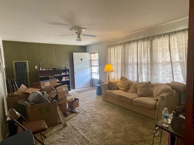 living room with carpet floors and ceiling fan