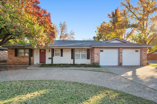 single story home featuring a garage