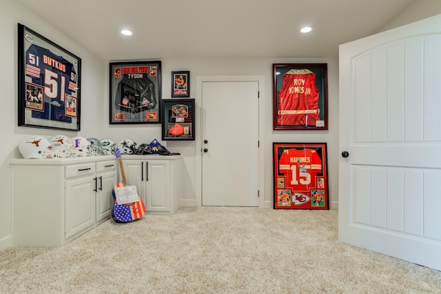 game room with light carpet