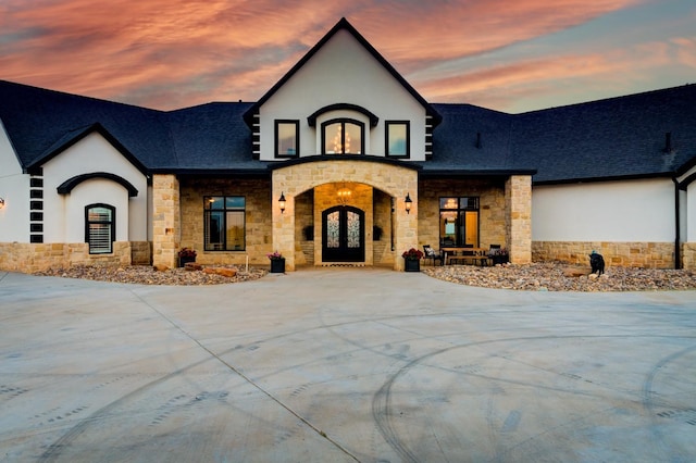 french country style house with french doors