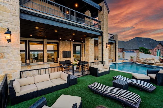 exterior space featuring outdoor lounge area and a patio