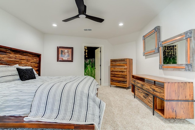 bedroom with light colored carpet