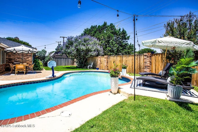 2912 76th St, Lubbock, TX 79423 - view of swimming pool with a fenced backyard and a patio