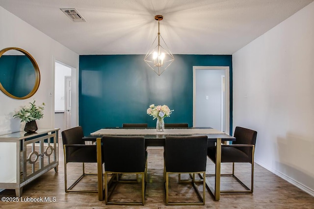 2912 76th St, Lubbock, TX 79423 - dining room featuring wood finished floors