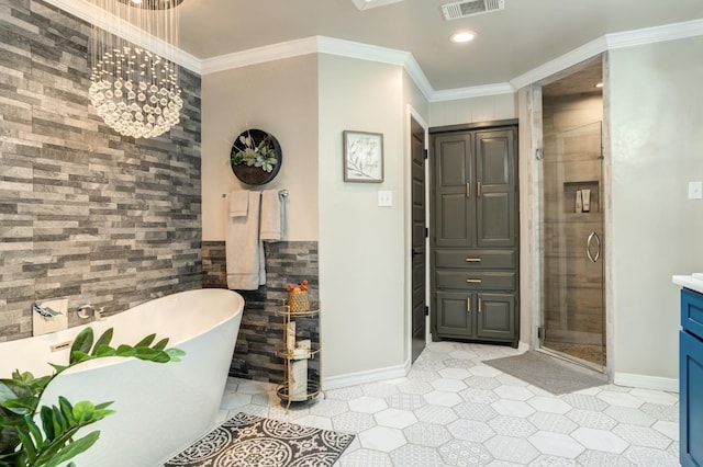 bathroom with vanity, crown molding, and plus walk in shower