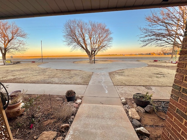 819 N Amherst Hwy, Earth, TX 79031 - view of yard at dusk