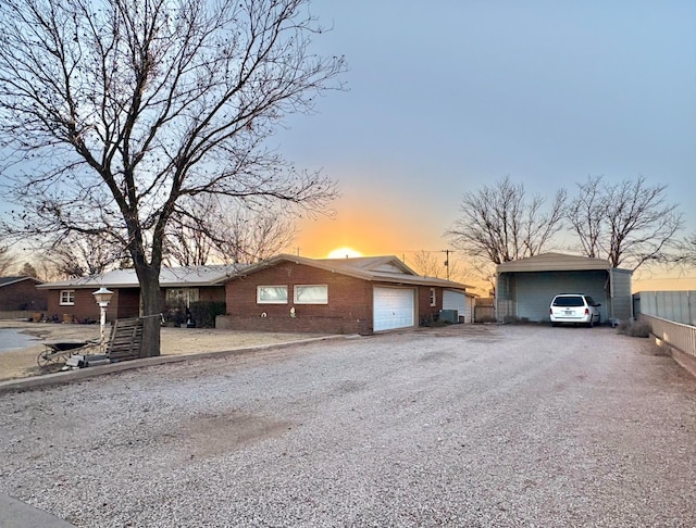 single story home with a garage