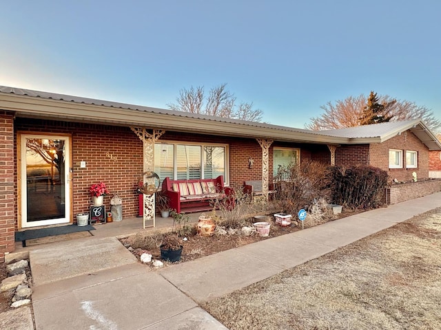 view of front of home featuring covered porch