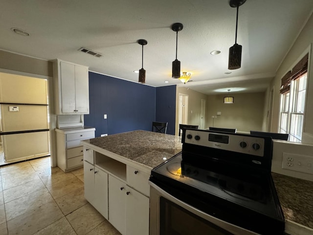 kitchen featuring white cabinetry, stainless steel electric range oven, light tile patterned floors, and pendant lighting